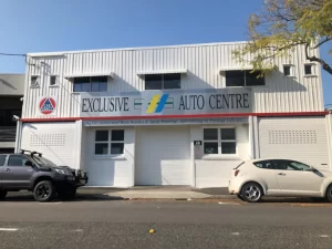 Revitalized business exterior with a fresh paint job, flaunting its renewed charm